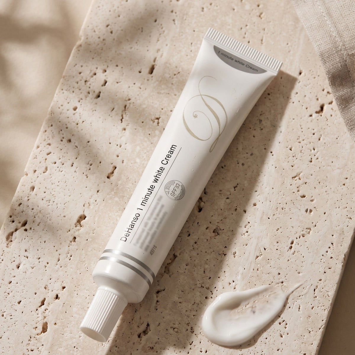 DeHanso 1 Minute White Cream tube with a cream swatch showing its texture