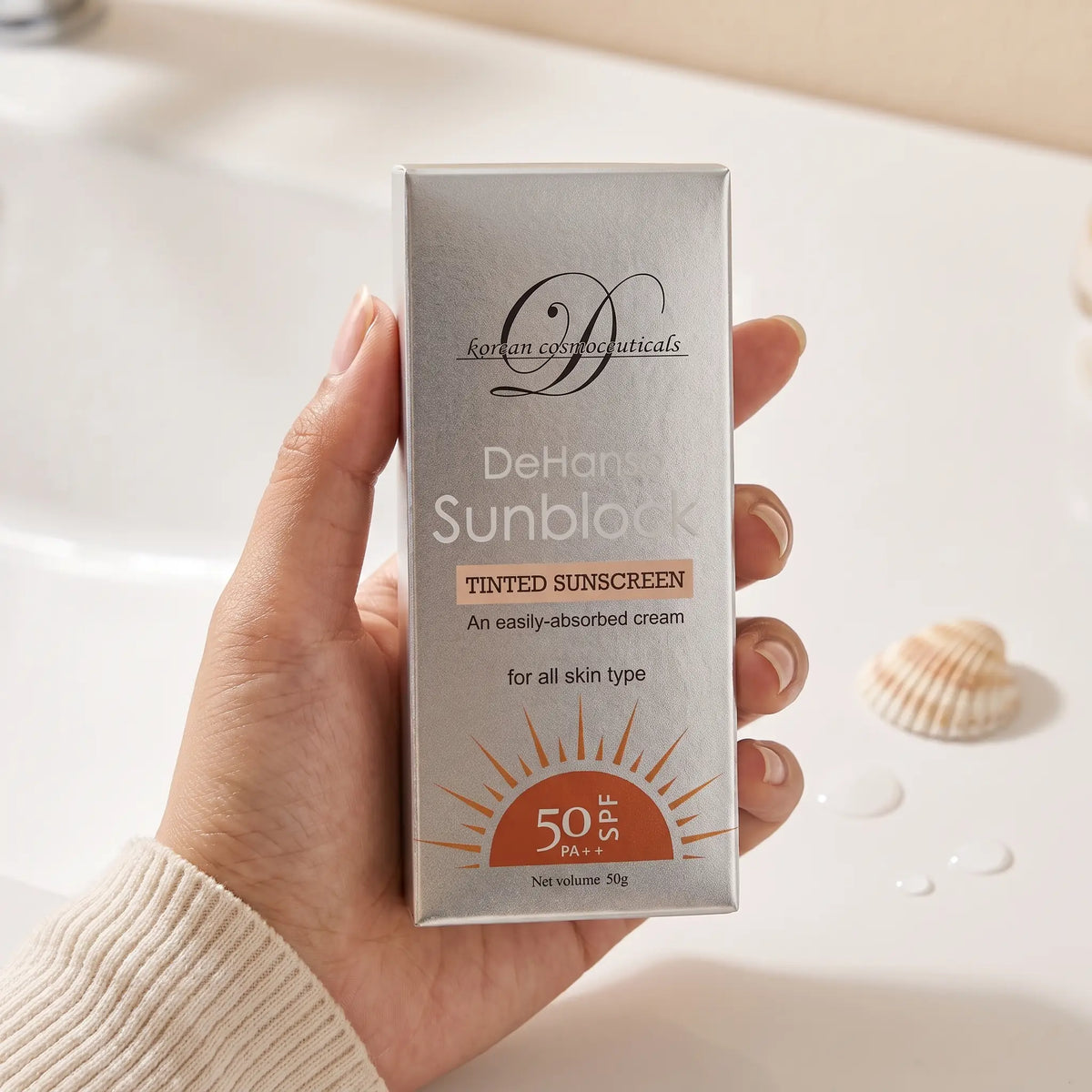 DeHanso Sunblock Tinted Sunscreen SPF 50 PA++ For All Skin Types 50g – held in hand, lifestyle